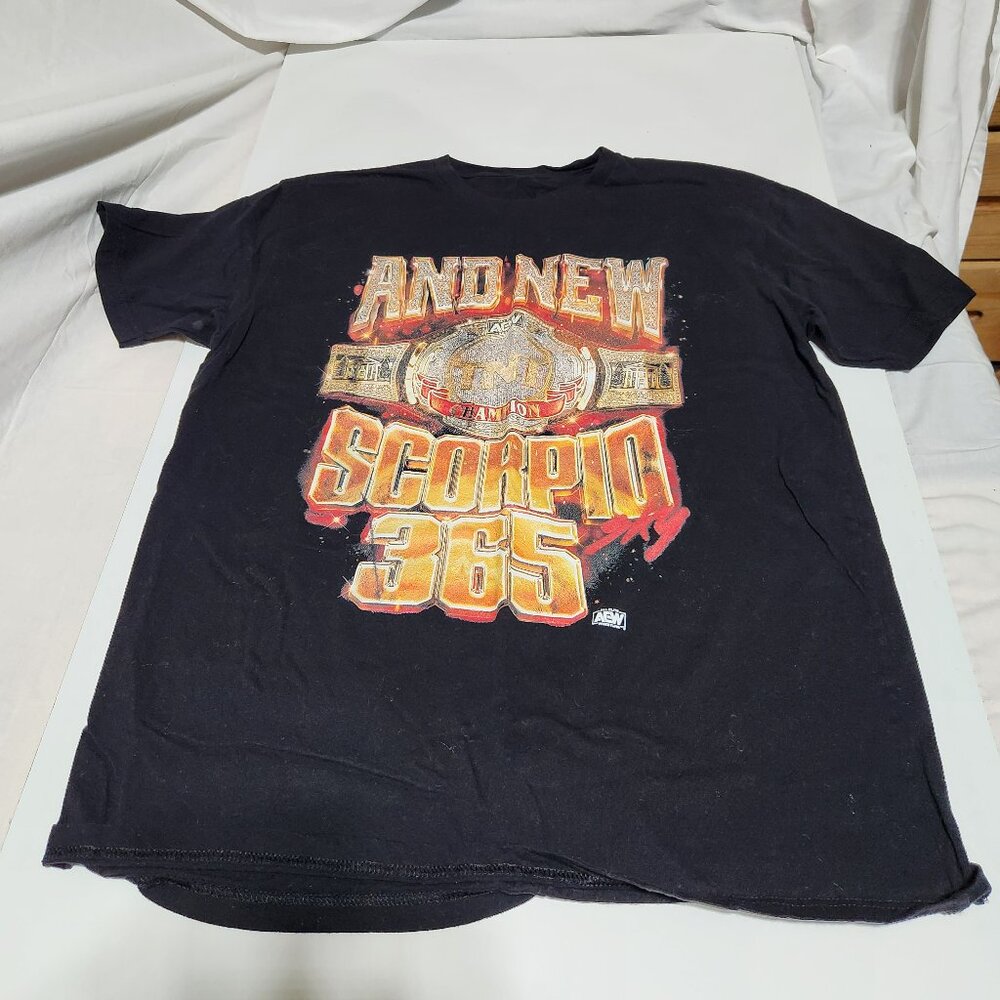 Scorpio Sky “And New” AEW Championship Graphic Tee – Black – Men’s Large